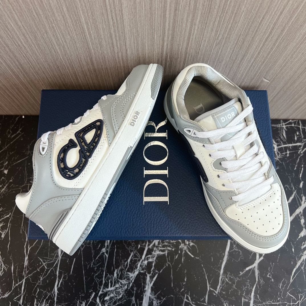 ua D*or b57 low-top sneaker gray and white