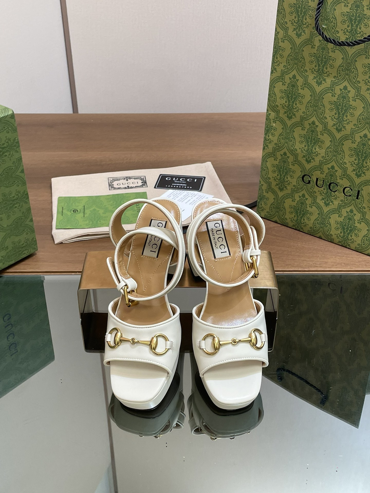 ua G*u*i horsebit platform sandal