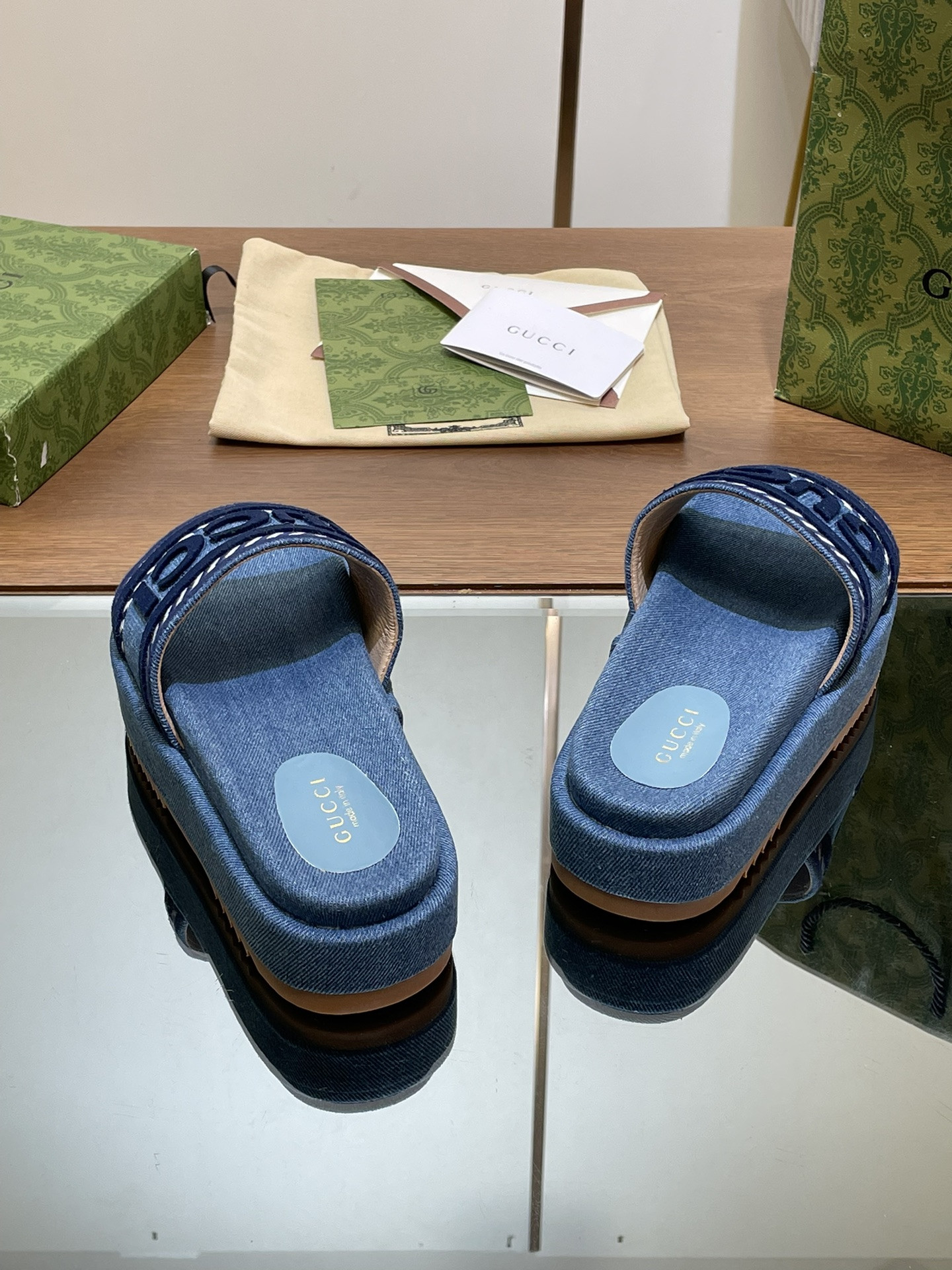 ua G*u*i slide sandal with G*u*i script
