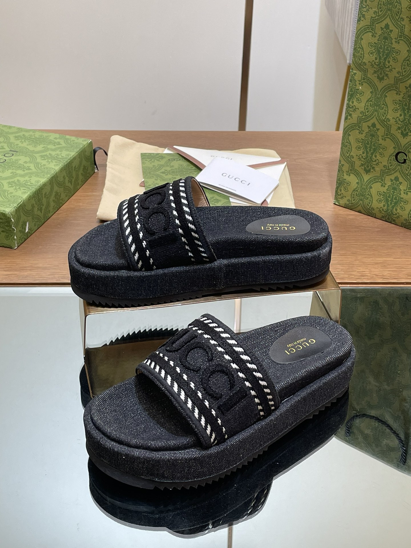 ua G*u*i slide sandal with G*u*i script