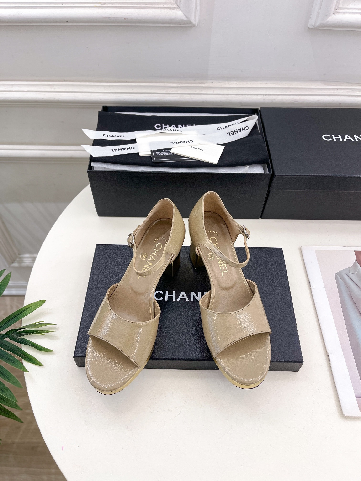 ua Ch*el heeled sandals