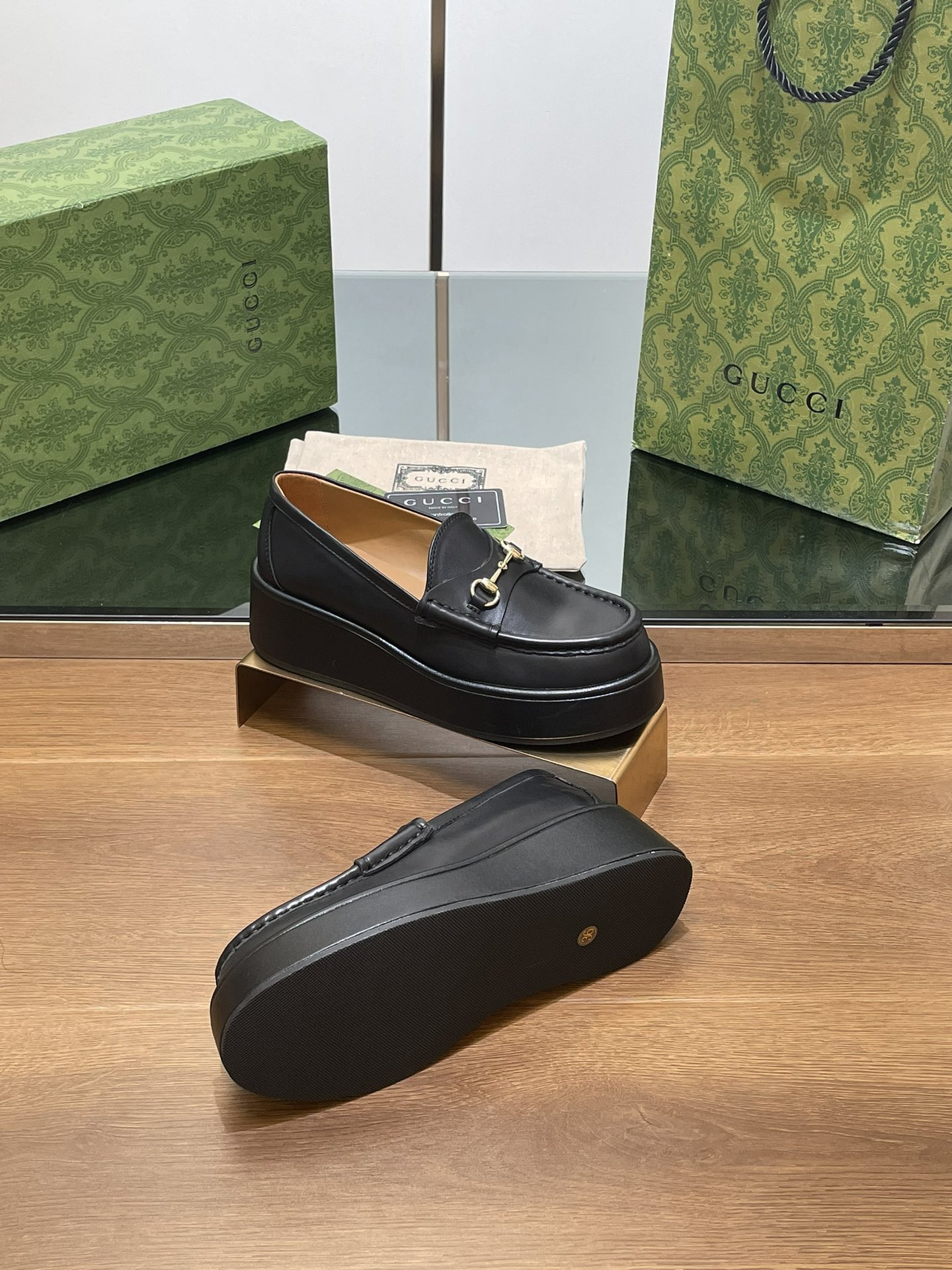 ua G*u*i horsebit wedge loafer