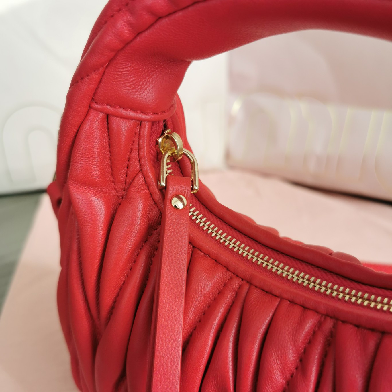 Miu Miu Wander matelassé nappa leather hobo mini-bag 14x17.5x5.5cm