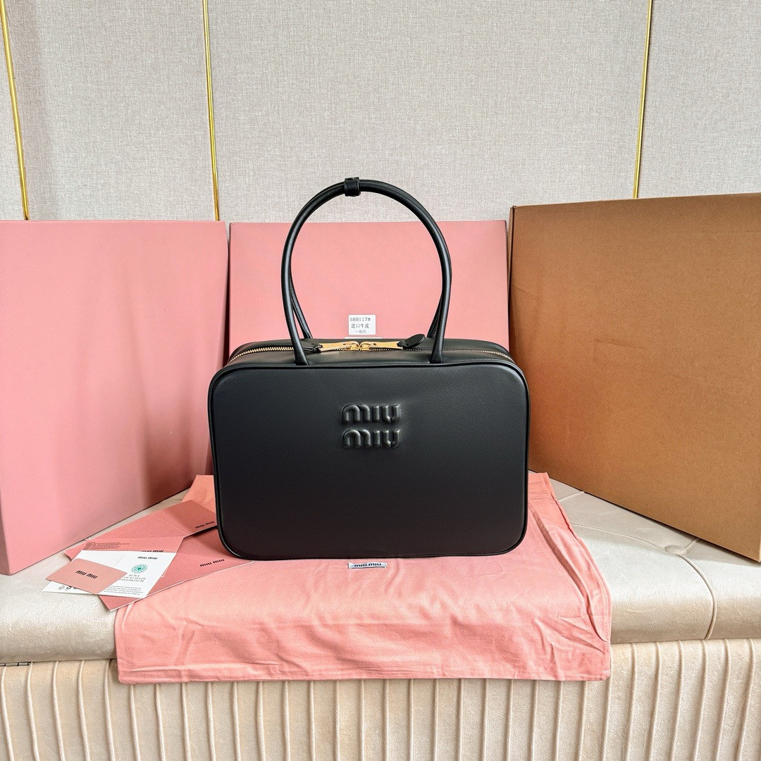 M*um*u leather top handbag-34x23x12cm