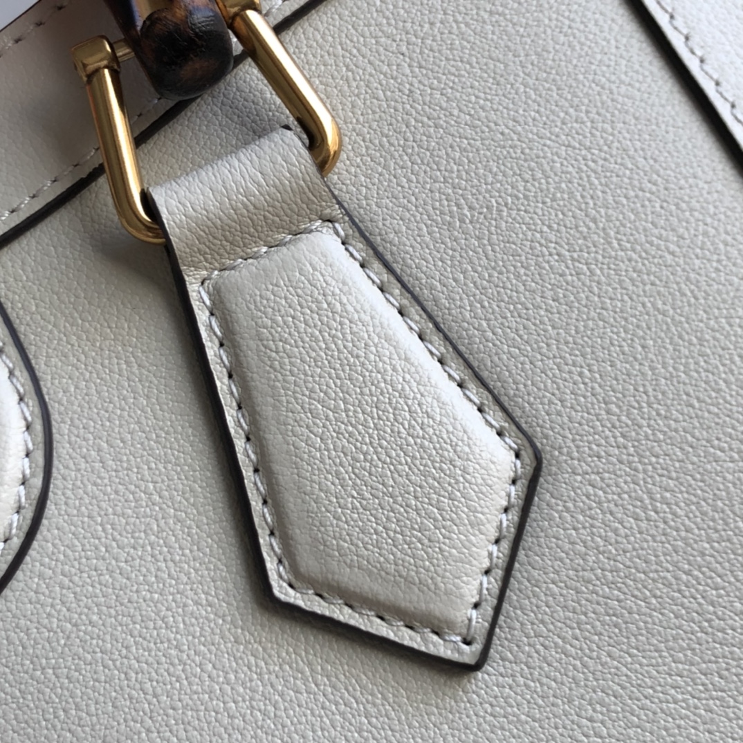 G*u*i diana top handbags