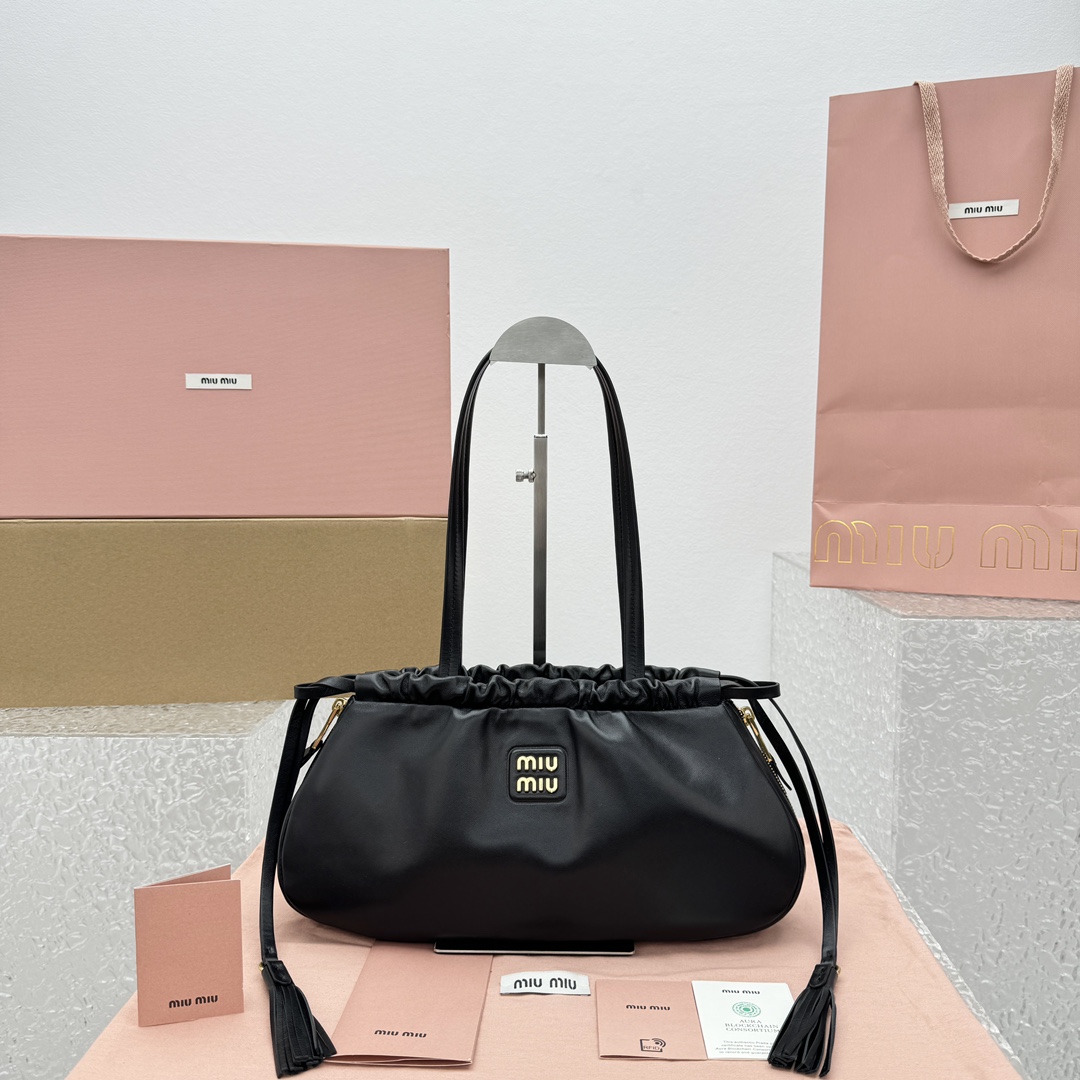 M*um*u leather hobo bag-35*18*9cm